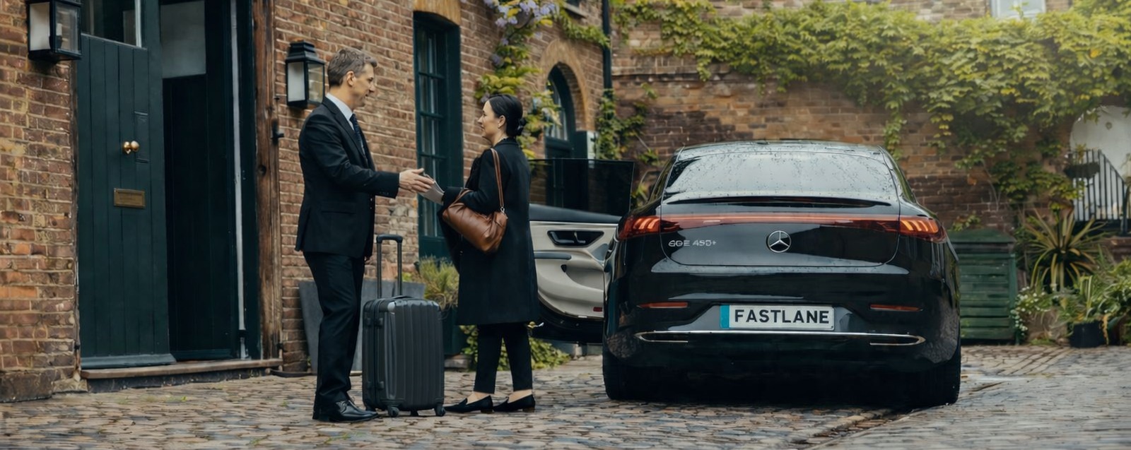 Real Blacklane chauffeur Peter gets out of his Mercedes, ready to greet his guest.